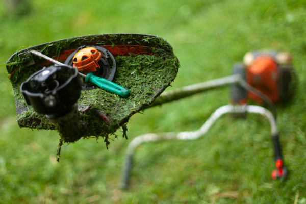 Weed whacker being repaired 